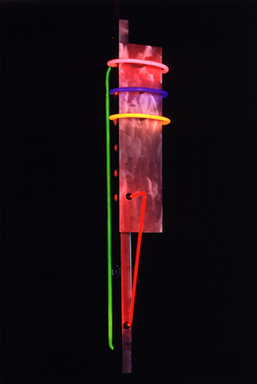 "Tribute", featured in this virtual neon art gallery, displaying the neon sculpture and neon art installations, including modern and contemporary art work as well as a line of neon clocks and wall sconces