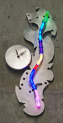 "Whimsy Clock II, featured in this virtual neon art gallery, displaying the neon sculpture and neon art installations, including modern and contemporary art work as well as a line of neon clocks and wall sconces
