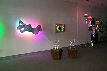 main room featured in this virtual neon art gallery, displaying the neon sculpture and neon art installations, including modern and contemporary art work as well as a line of neon clocks and wall sconces