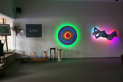 main room featured in this virtual neon art gallery, displaying the neon sculpture and neon art installations, including modern and contemporary art work as well as a line of neon clocks and wall sconces