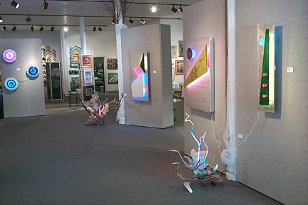 main room featured in this virtual neon art gallery, displaying the neon sculpture and neon art installations, including modern and contemporary art work as well as a line of neon clocks and wall sconces